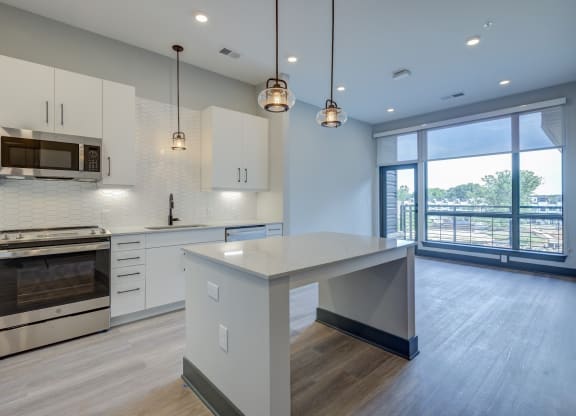 Kitchen Bar With Granite Counter Top at The Walker, Cary, NC, 27511