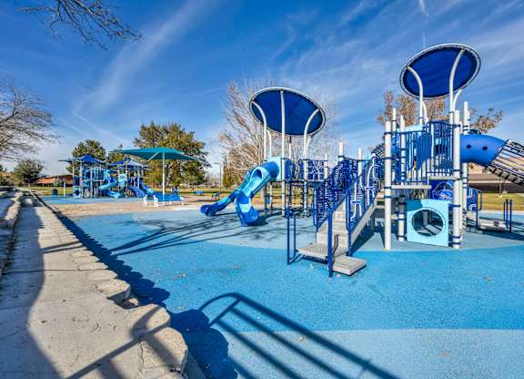 Playground with blue slide at Peaks at the Park, Reno, Nevada