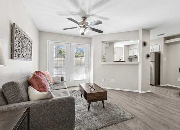 Open concept living area with kitchen pass through at Polo Club Apartments, Austin, Texas