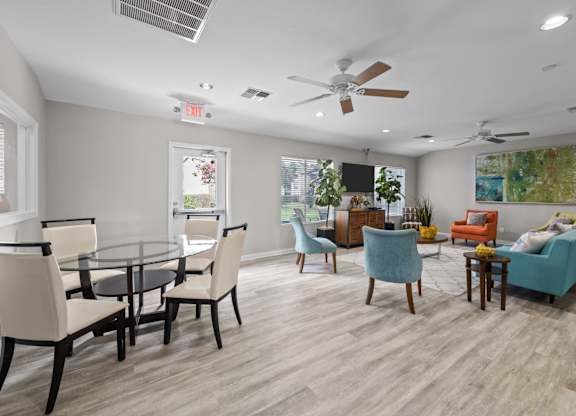 Dining area and living room with contemporary furniture at Peaks at Universal City Apartments, Universal City, TX 78148