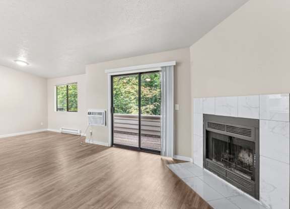 Living Room with Fireplace at Peaks on Pines, Washington