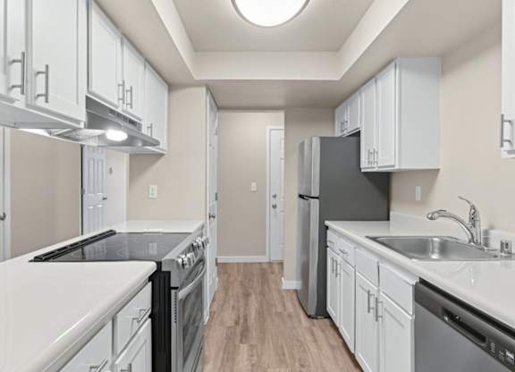 Kitchen with white cabinets at Peaks on Pines, Spokane Valley, WA, 99216