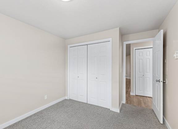 Bedroom with Closet at Peaks on Pines, Spokane Valley, Washington