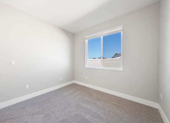 A Room with a Window Showing a Blue Sky at Montessa Apartments, Vacaville