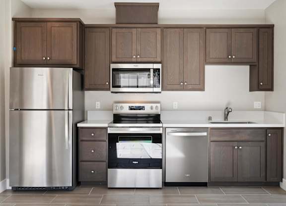 A Kitchen with a Oven at Montessa Apartments, Vacaville, CA
