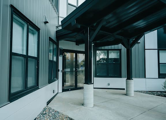 A modern building with a covered walkway.
