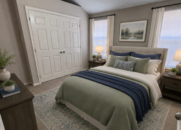 A bedroom with a bed, a dresser, and a ceiling fan.
