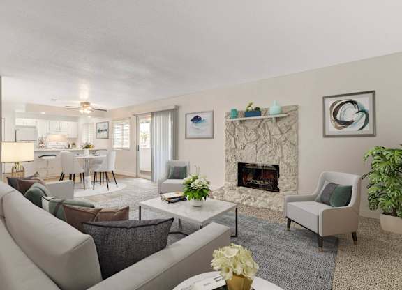 A living room with a fireplace and a dining table.