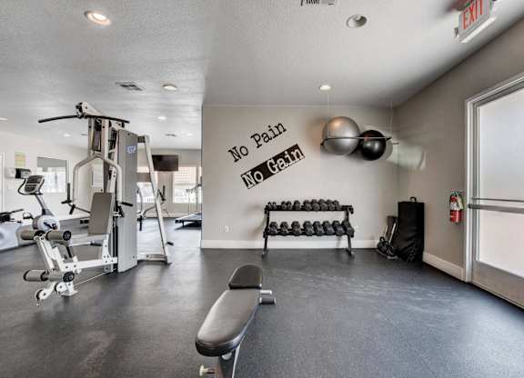 A gym with a sign that says