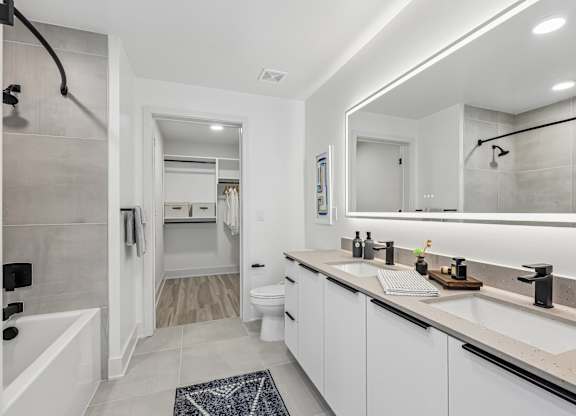 Dual bathroom vanities with quartz countertops