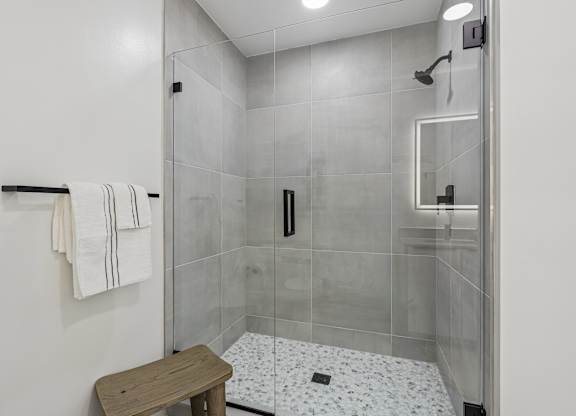 Full-height bathroom wall tile in bath/shower