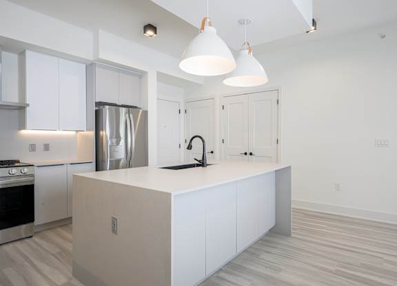 Quartz waterfall edge islands*