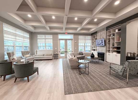 Clubhouse with recreation center, gaming lounge and fireplace