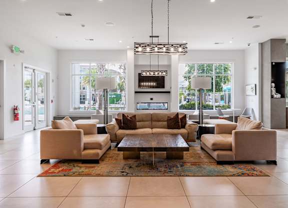 Impressive clubhouse with fireplace and recreation center
