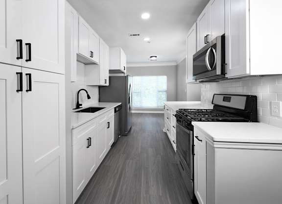 BRAND NEW SUITES - quartz countertops, stainless steel appliances, large pantries and matte black finishes and hardware