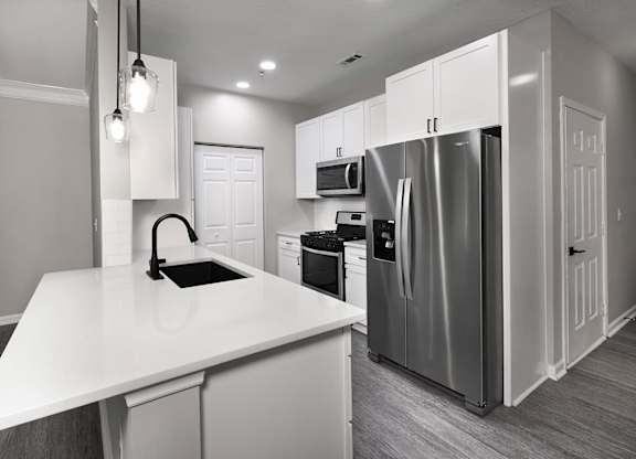 BRAND NEW SUITES - quartz countertops, stainless steel appliances, and matte black finishes and hardware