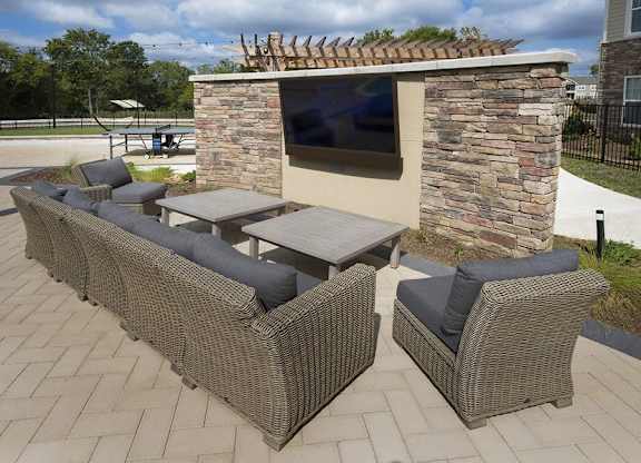 Outdoor living space with gas grills and fire pit