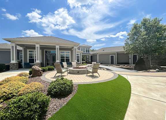 Outdoor entertaining areas with fire pit and fountain