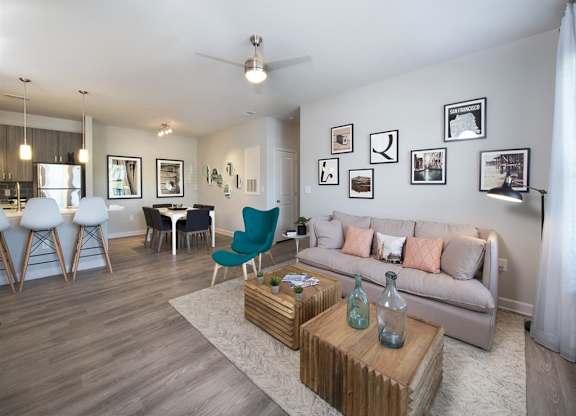 Spacious living room with hardwood-inspired flooring