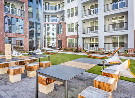 Outdoor lounge and entertaining areas with cornhole