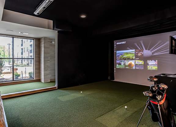 Virtual golf simulator with putting green