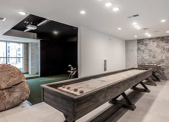 Gaming lounge with billiards, foosball table, shuffleboard and more
