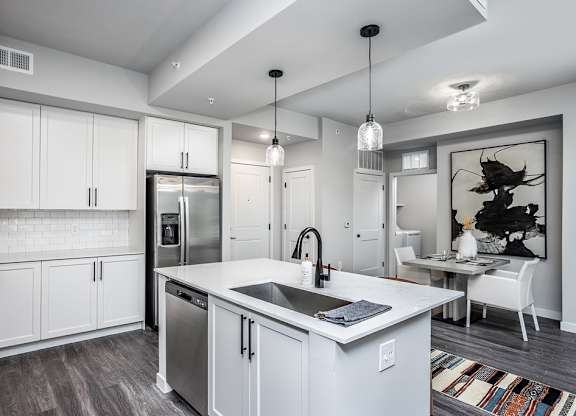 Fully-equipped kitchen and dining area in model