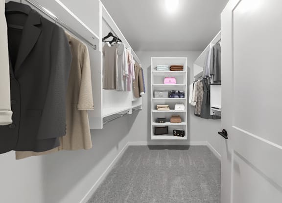3-bedroom townhome large walk-in closet with California-style built-in shelving