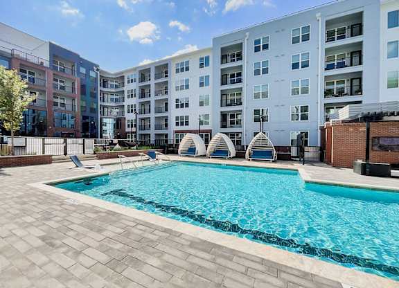 Saltwater pool with swim lane, sun shelves, cabanas and bubblers