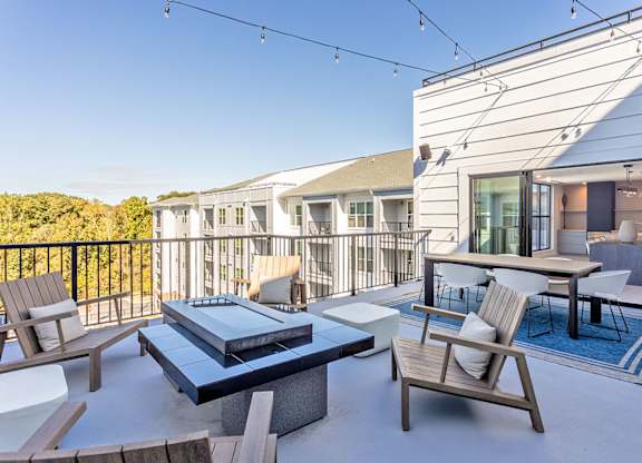 Skydeck with outdoor sundeck and lounge areas overlooking the saltwater pool
