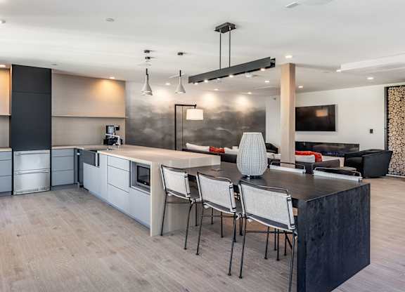 Skydeck with kitchen, fireplace, sundeck, lounge area and TVs