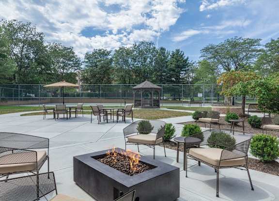 Outdoor entertaining area with grill and fire pit