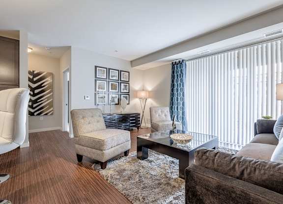 Living room with ceiling to floor windows