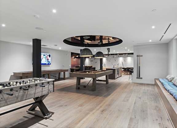 Foosball and pool table in gaming lounge