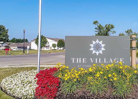 The Village at Cobblestone Court Apartments located in Painesville, Ohio