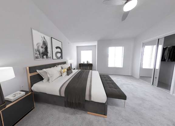 Bedroom with wall-to-wall oversized mirrored closet