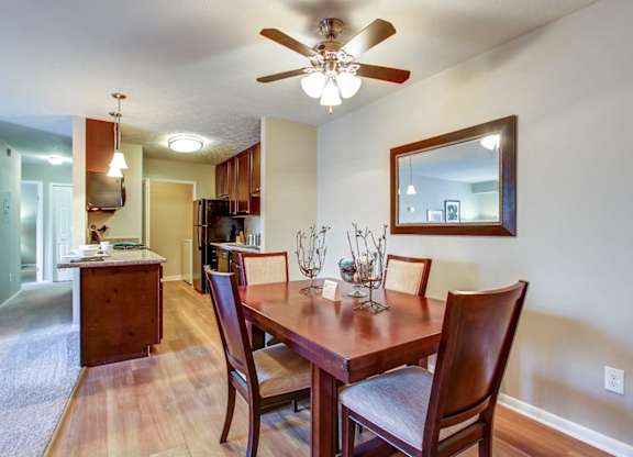Dining area with hardwood-inspired flooring