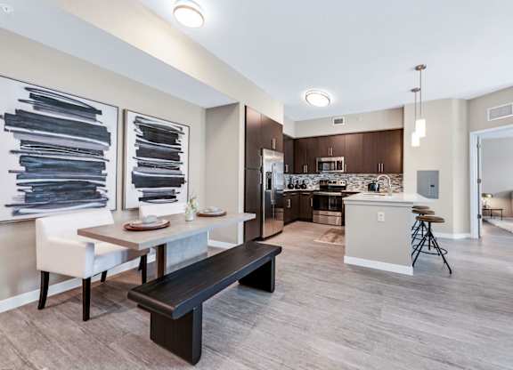 Hardwood-inspired flooring throughout entire apartment