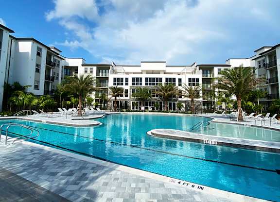 Heated saltwater pool with swim lane, cabanas, sun shelves and WiFi
