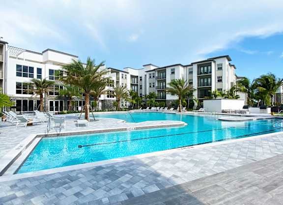 Heated saltwater pool with swim lane, cabanas, sun shelves and WiFi