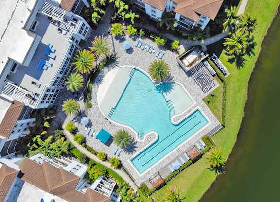 Heated saltwater pool with swim lane, cabanas, sun shelves and WiFi