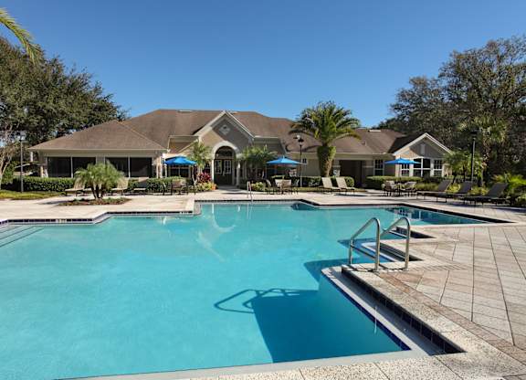 Outdoor pool with sundeck and grills