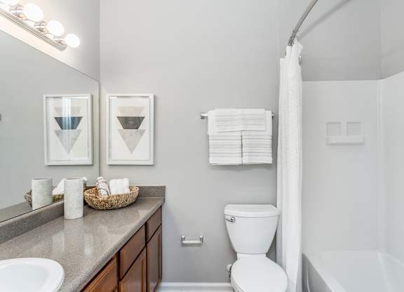 Tubs with curved shower rods