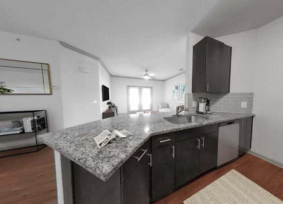 Townhomes feature fully-equipped kitchens with granite countertops