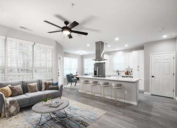 Legacy units feature quartz countertops, matte black finishes and stainless steel appliances