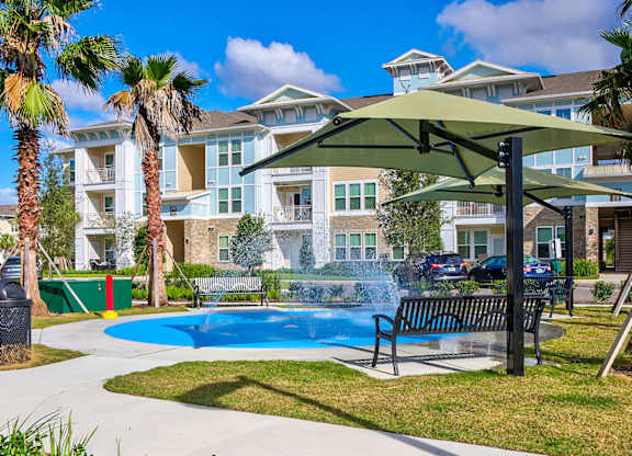 New splash pad, swing benches and charcoal grill area