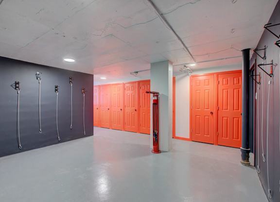 Storage area features bike storage and individual storage rooms.
