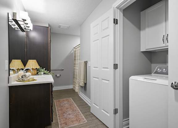 A laundry room with a washer and dryer.