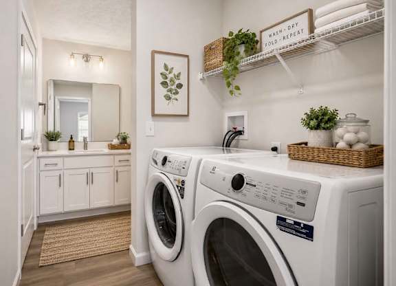 A laundry room with a washer and dryer.
