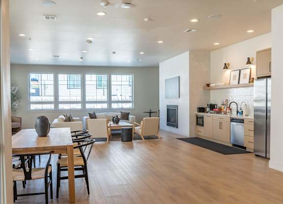 A modern kitchen with a dining table and chairs at Westgate Apartment Homes, Pendleton, OR, 97801